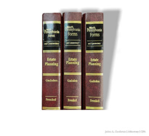 Making charitable donations part of your estate plan. Estate planning law books on a white background.